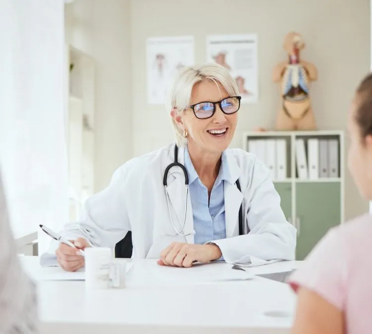 A doctor at High Street Family Practice with a patient